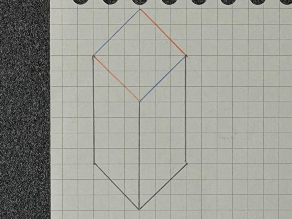 正面が角の直方体の描き方STEP4完了:上の面(天面)を反対側の辺と平行になるように描いている途中。赤と青で線を分けている。