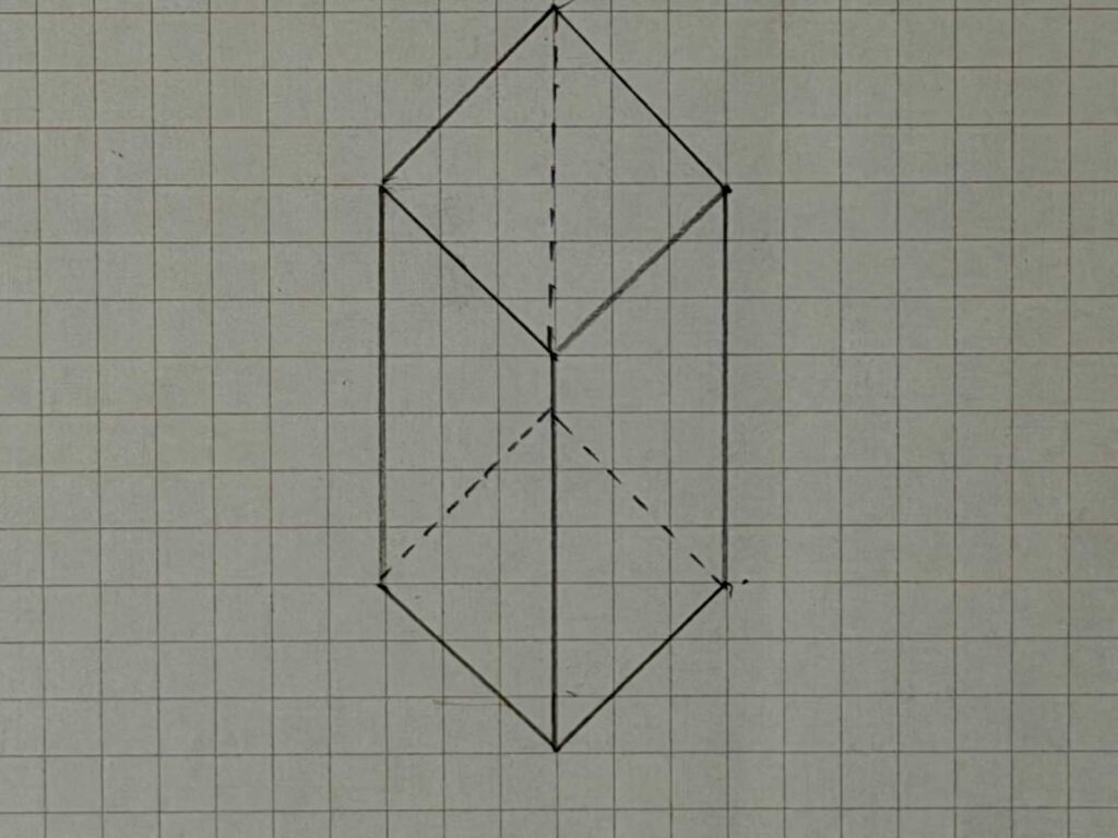 正面が角の直方体の描き方STEP5完了:見えない奥の辺と底面を点線で描き足し、完成した直方体の図。